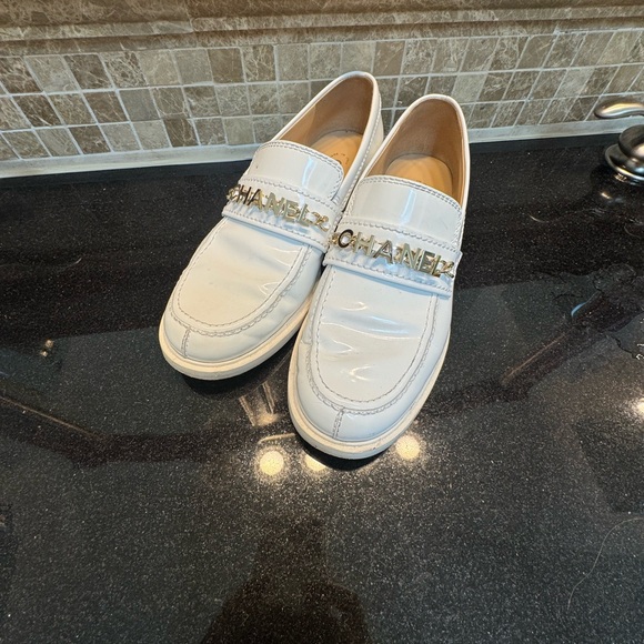 CHANEL White Loafers with Silver Logo - Picture 1 of 8